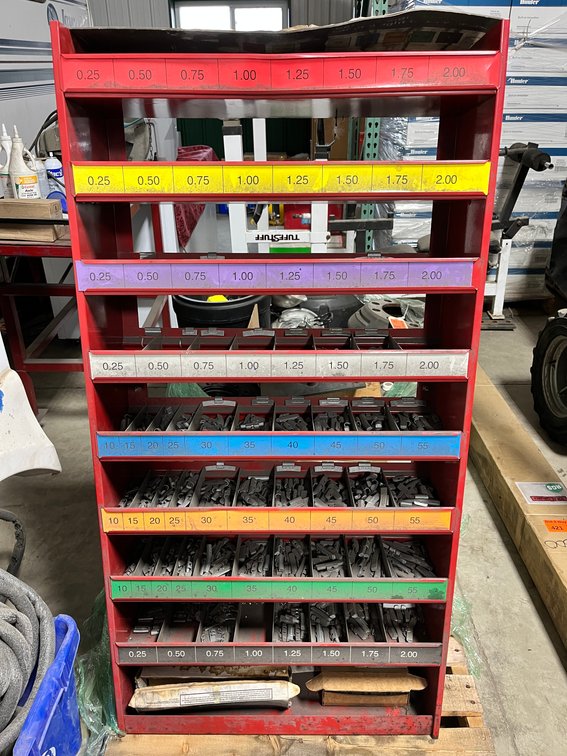  9 Tier Metal Rack With Large Assortment of Wheel Weights