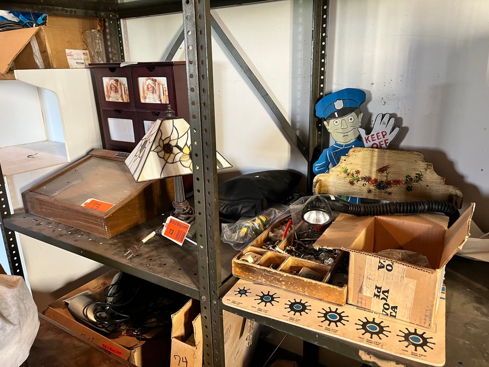 Buck Knives Display With Assorted Household Items