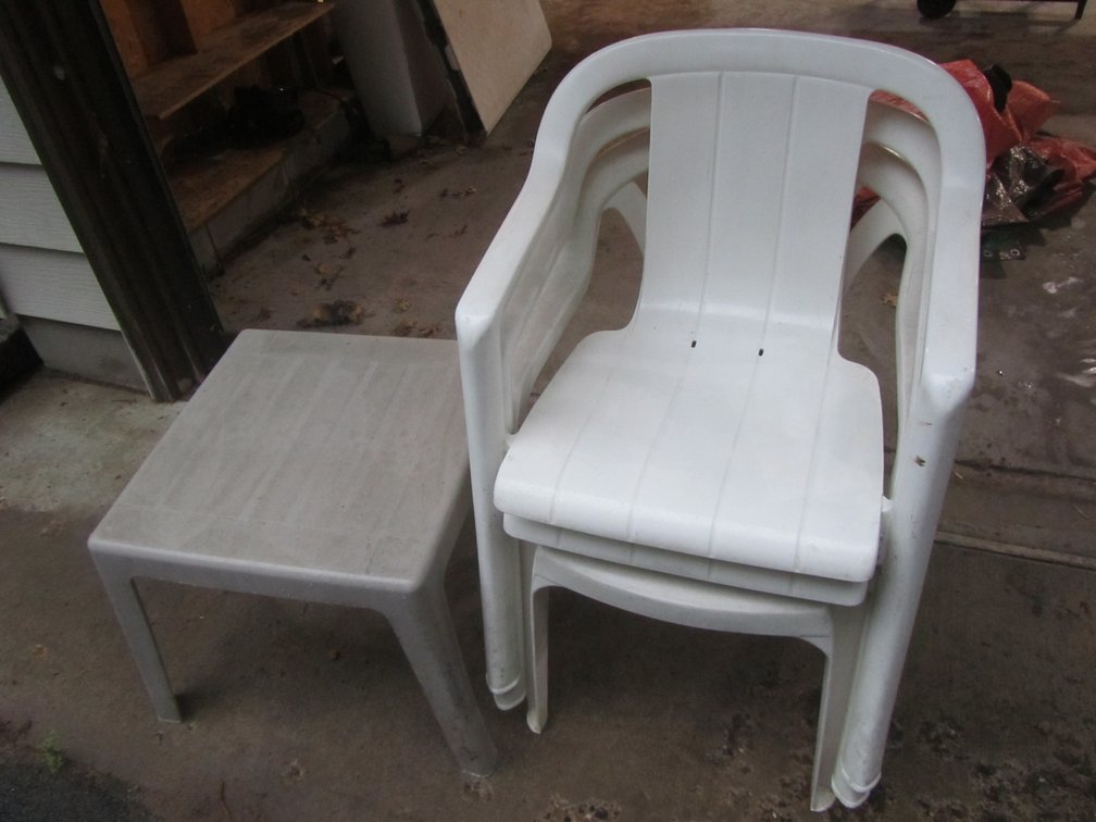 (4) Plastic Lawn Chairs W/Side Table