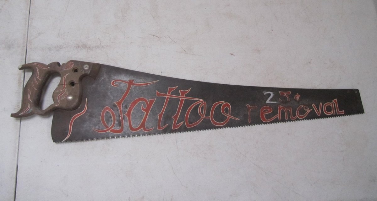 Tattoo Removal Painted Hand Saw