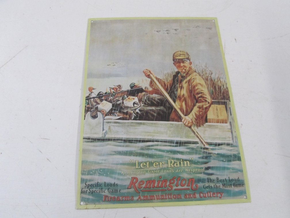 Remington "Let'er Rain" Metal Embossed Sign