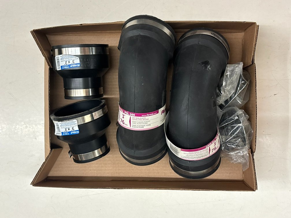(2) Plumbqwik Rubber Elbows and (2) Rubber Couplings