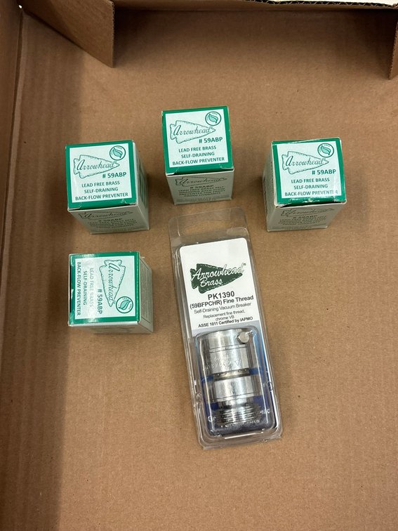(4) Arrowhead Back-Flow Preventer and (1) Vacuum Breaker