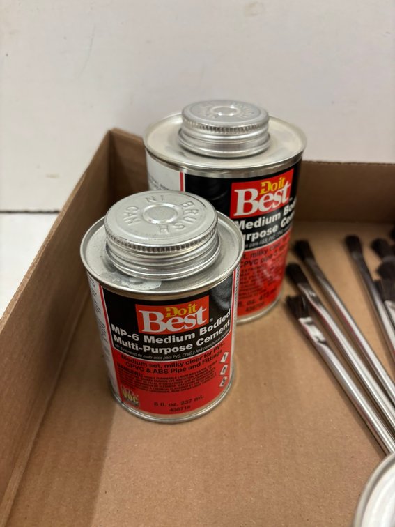 (2) ABS Cement, (2) Multipurpose Cement, and Brushes