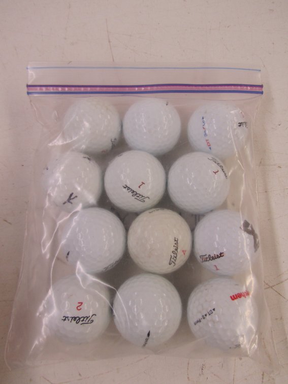 (12) Titleist Golf Balls