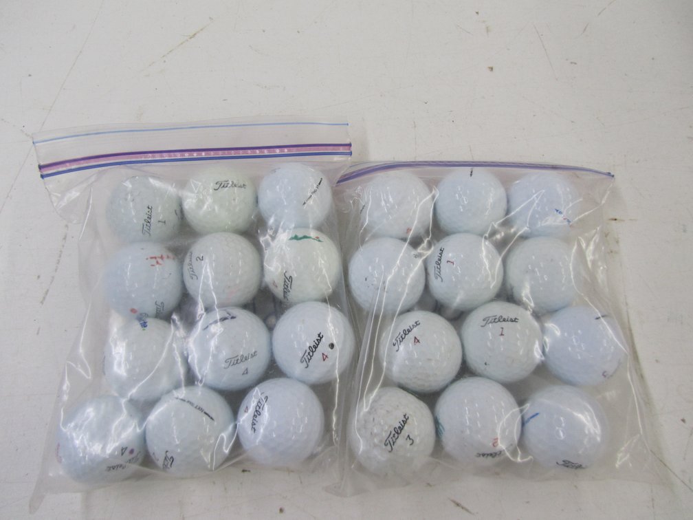(24) Titleist Golf Balls