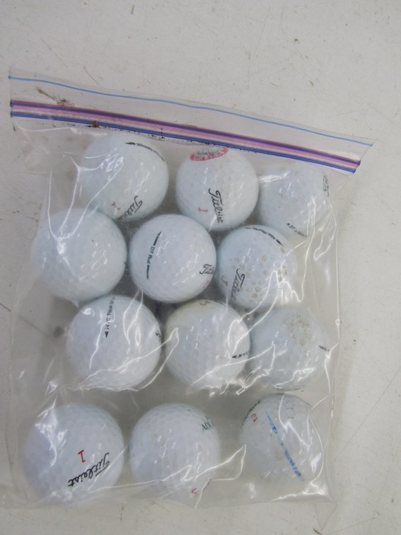 (12) Titleist Golf Balls