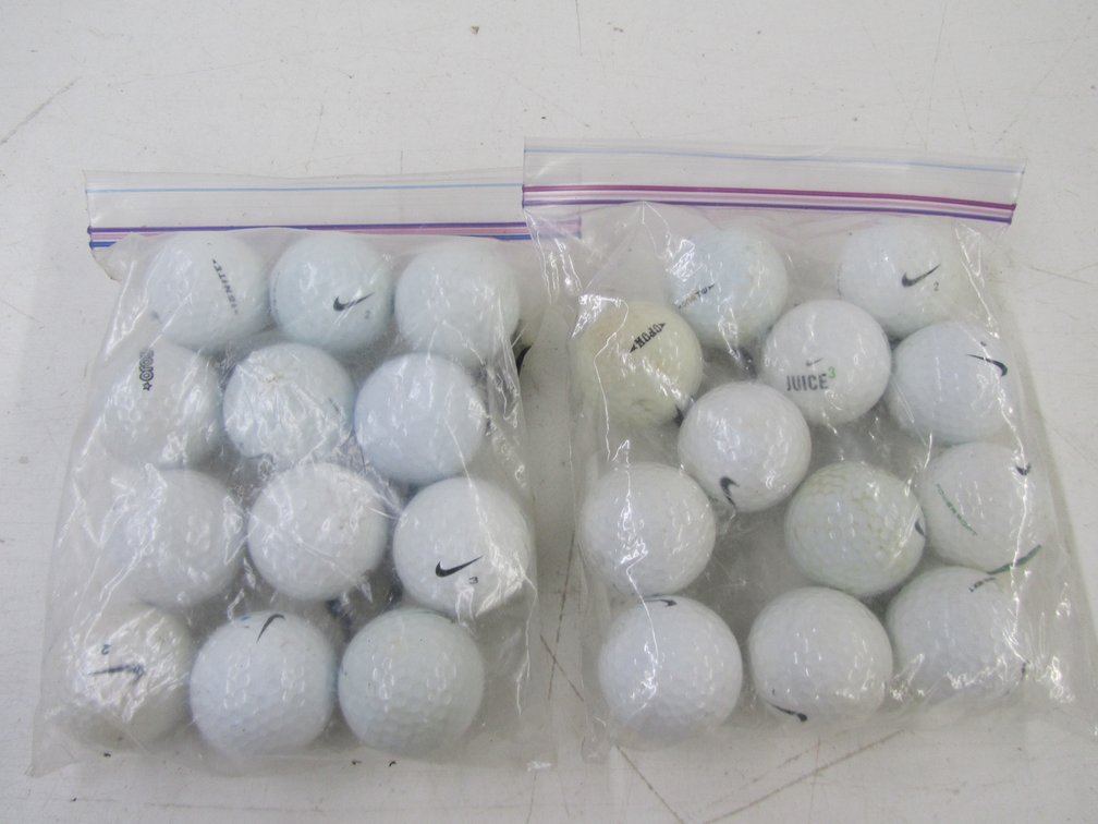 (24) Nike Golf Balls