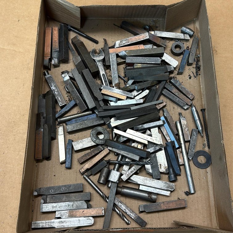 (60-80) Assorted Lathe Tool Bits, (5) Drill Bits, (3) Machinist Washers, (1) Open-End Wrench