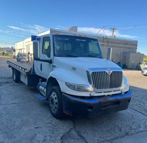 Image for 2020 & 2019 International Flatbed Tow Trucks & 2005 Colorado Plow Truck