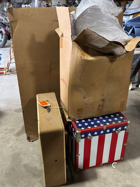 Box Fan, Box of White Hats/ Visors, and Printed Square Trunk