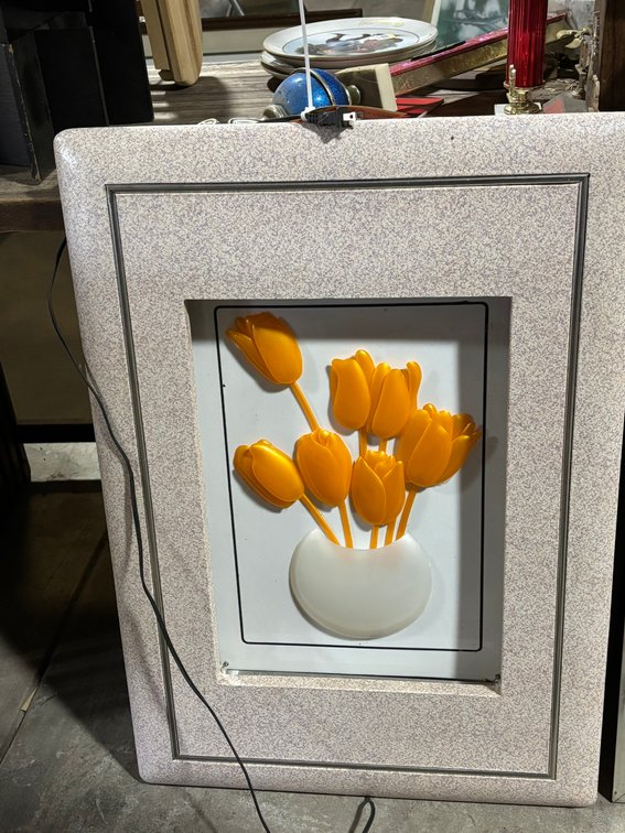 Wall Hanging of Orange Flowers and Mirror