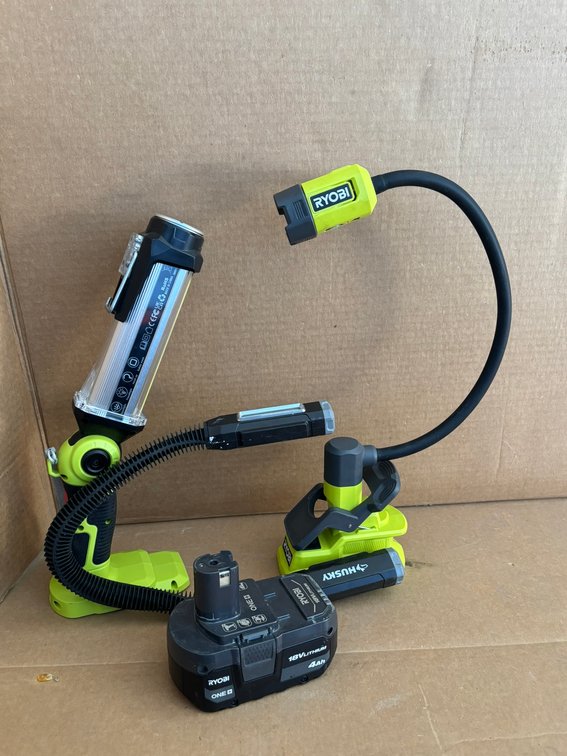 (2) Ryobi Work Lights, Ryobi 18V Battery and (1) Husky Work Light