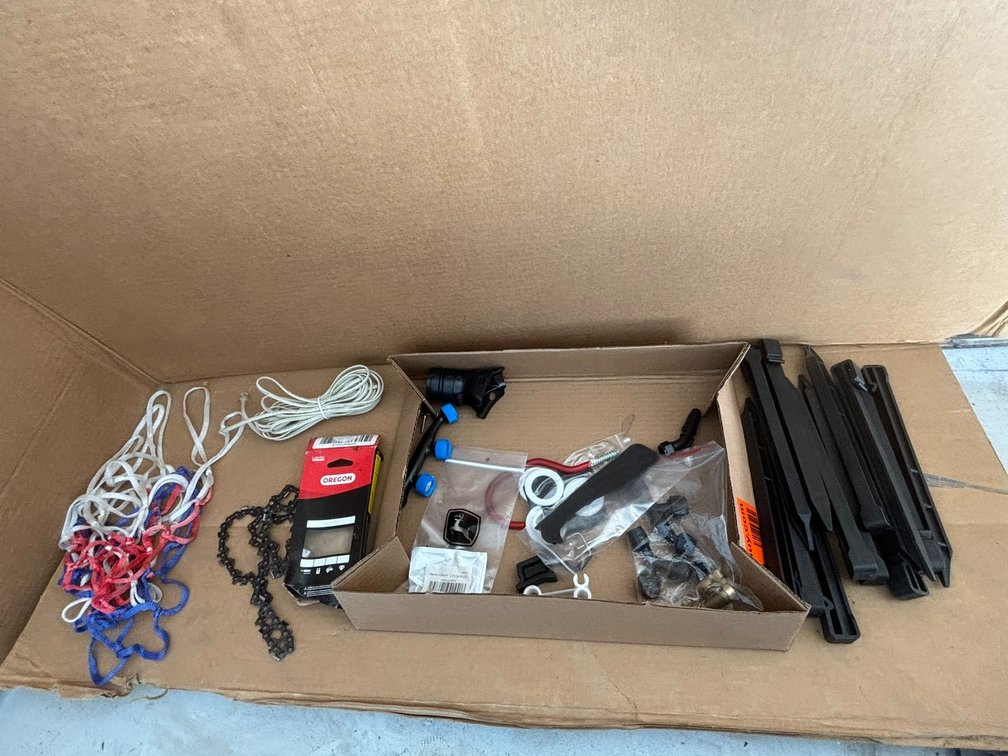 Assortment of Sprinkler Parts, Garden Stakes and Oregon Chain