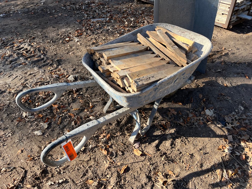 Wheelbarrow Full of Wood Stakes