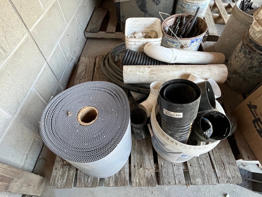 Pallet of Drain Tile and Plumbing Parts