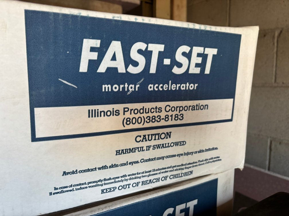 Box of Fast Set Mortar Accelerator
