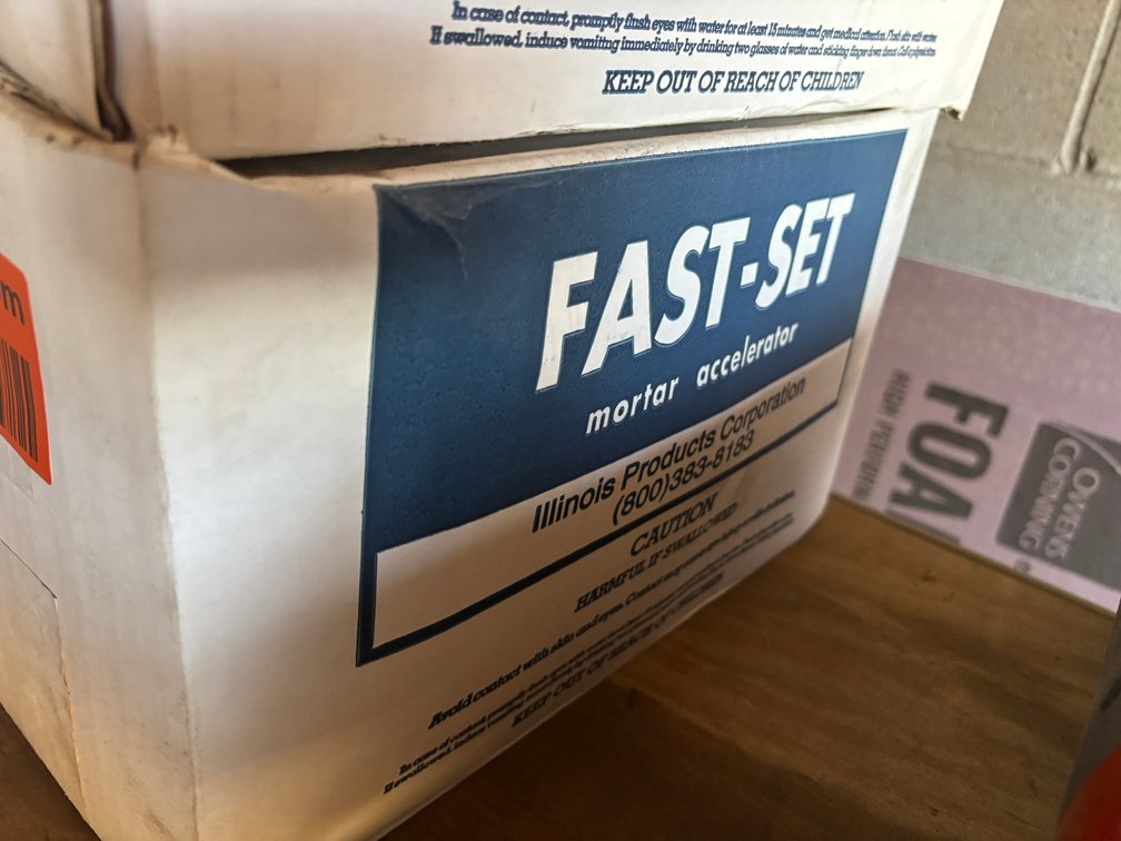Box of Fast Set Mortar Accelerator