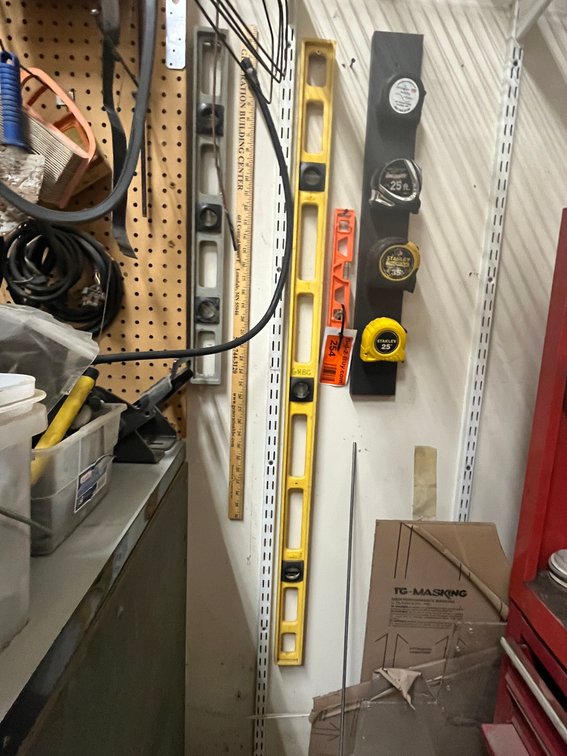 (3) Levels and (4) Tape Measures