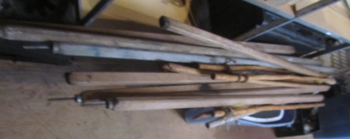 Lot Of Tent Stakes, Walking Sticks, Laundry Baskets, And Tubs