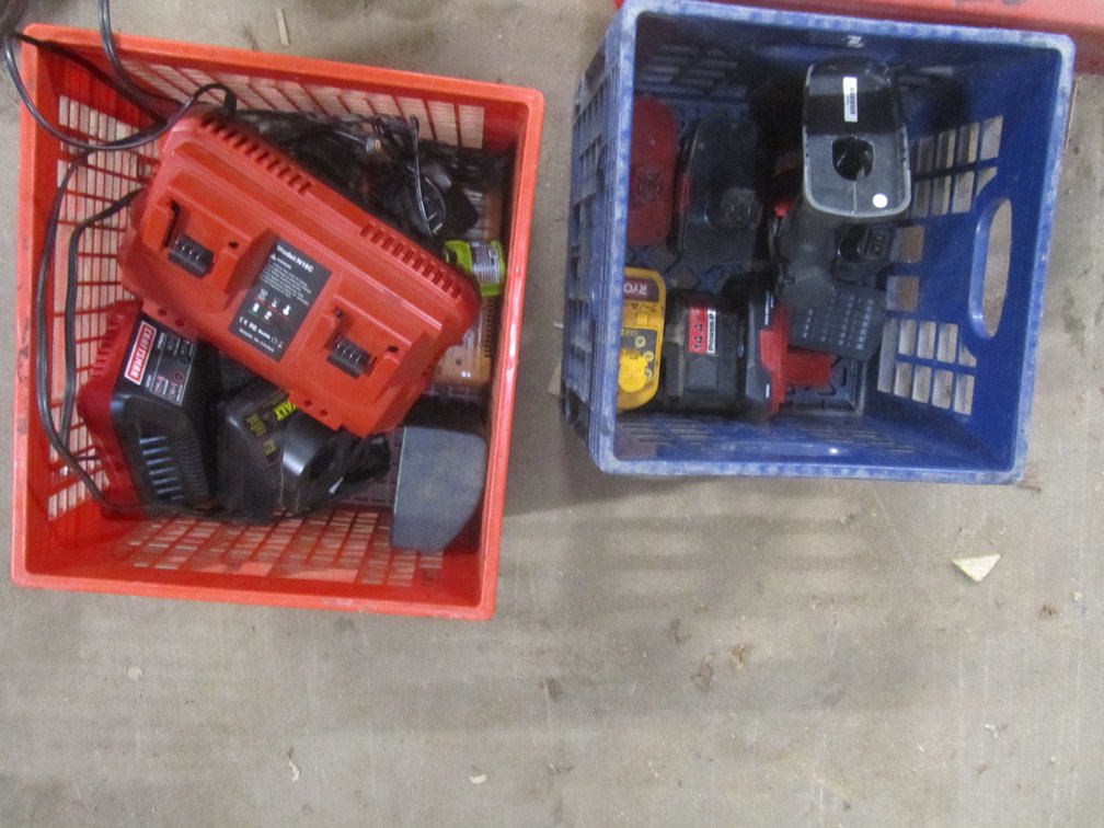 Lot Of Power Tool Batteries And Chargers