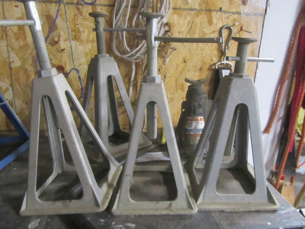 (4) Jack Stands, Tire Wrench, And A Bottle Jack