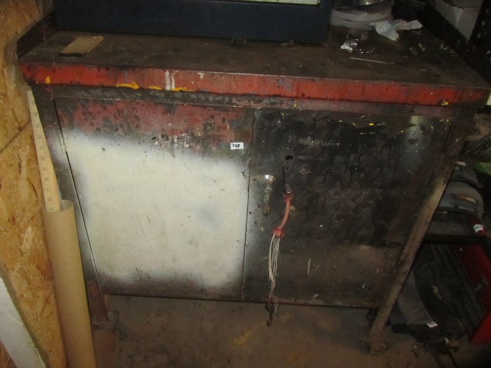 Metal Storage Cabinet On Casters Full Of Assorted Welding Supplies