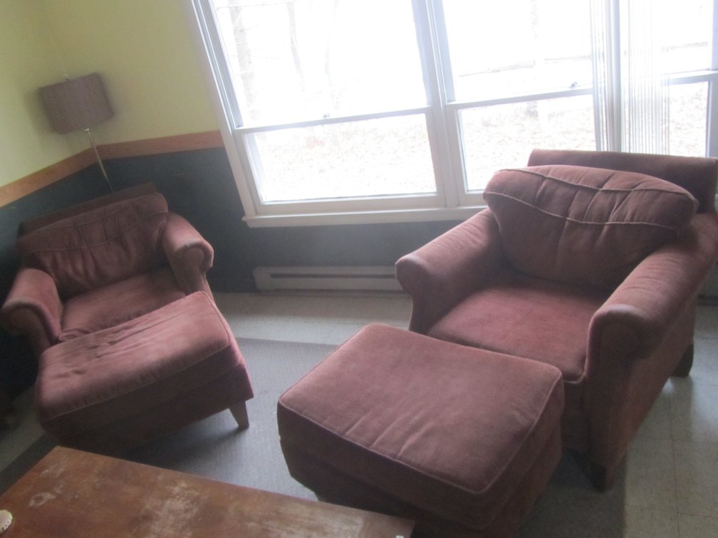Pair Of Soar Chairs And Ottomans