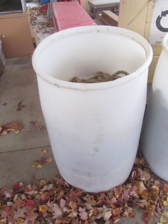 Large Plastic Barrel Full Of Braided Rope