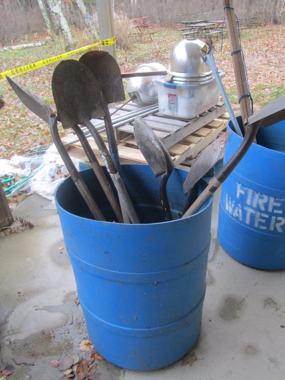 Plastic Barrel w/(7) Spade Shovels