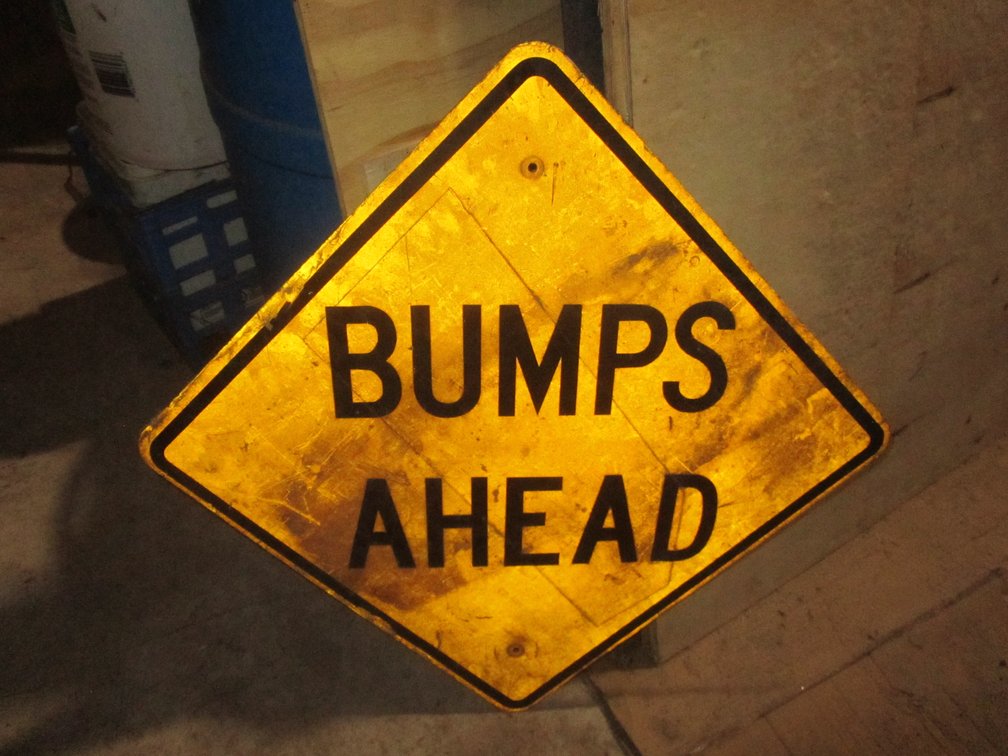 Bumps Ahead Road Sign