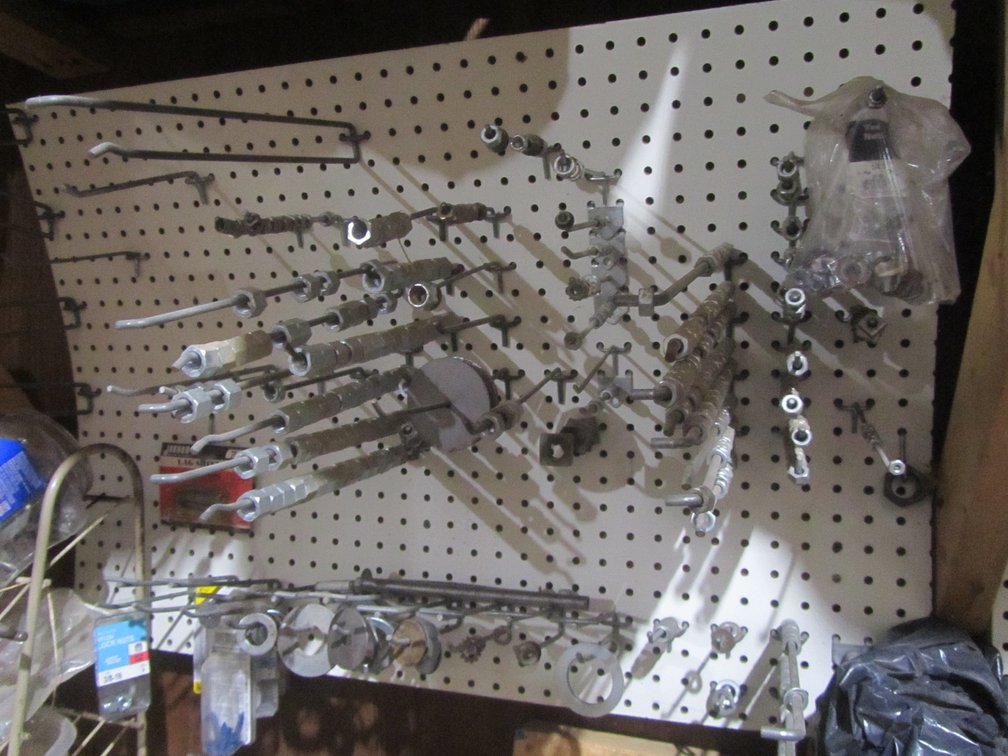 Pegboard Full Of Assorted Nuts And Washers