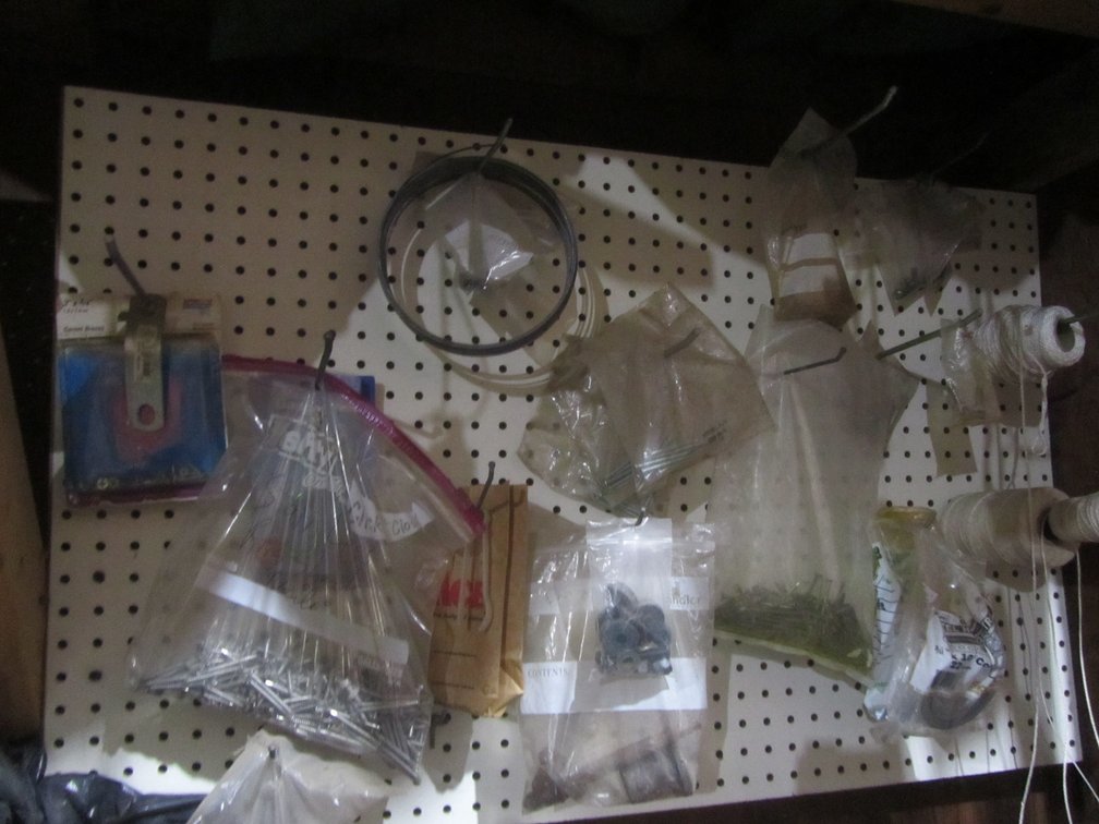Pegboard Full Of Assorted Hardware
