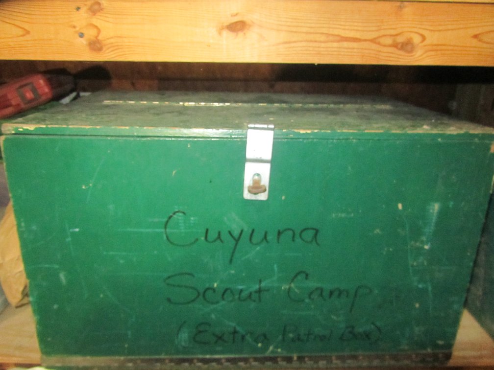 Wood Storage Box Full Of Camping Dishware And Utensils