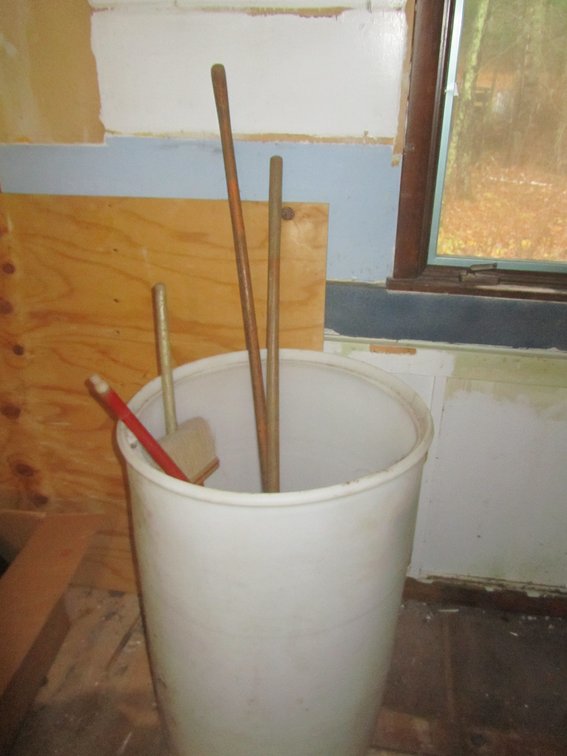 Large Plastic Barrel w/Assorted Brooms