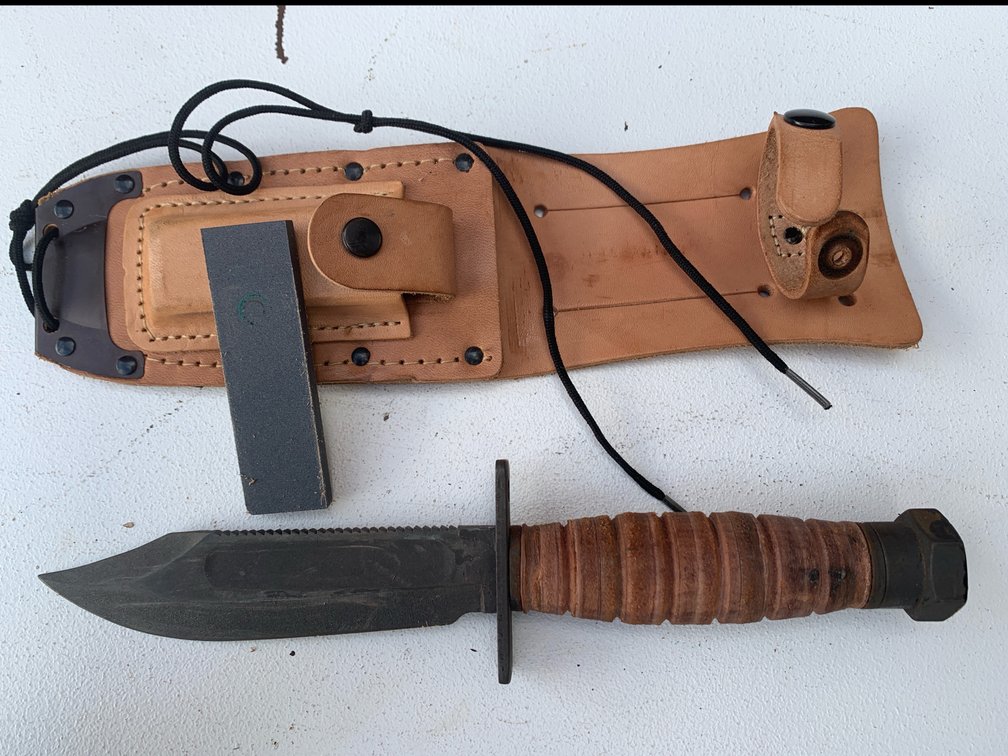 Knife With Hard Leather Handle And Steel Pommel. Sheath Includes Pocket For Sharpening Stone