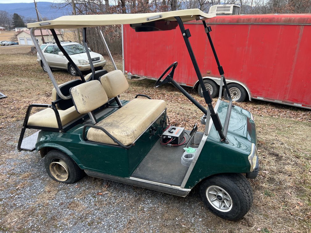 No Reserve - 1991 Club Car w/Charger - Batteries Need Replacing & Left Rear Tire is Flat