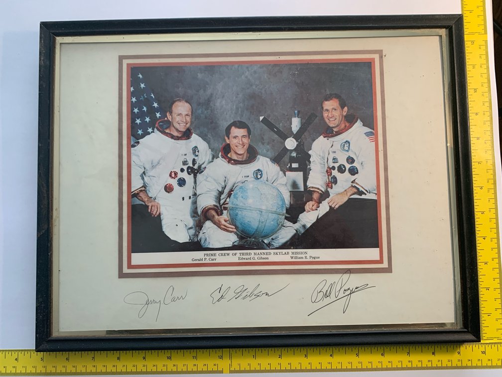 Picture Of The Prime Crew Of The Third Manned Skylab Mission. Signed By The Crew. Signatures Have Not Been Authenticated. In A 16”x12” Frame