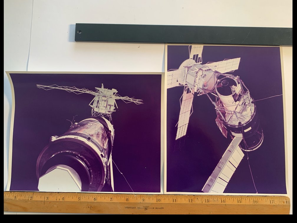 Two 8”x10” Photos. One Shows the Skylab Space Station. One Shows the Apollo-Soyuz Docking Module