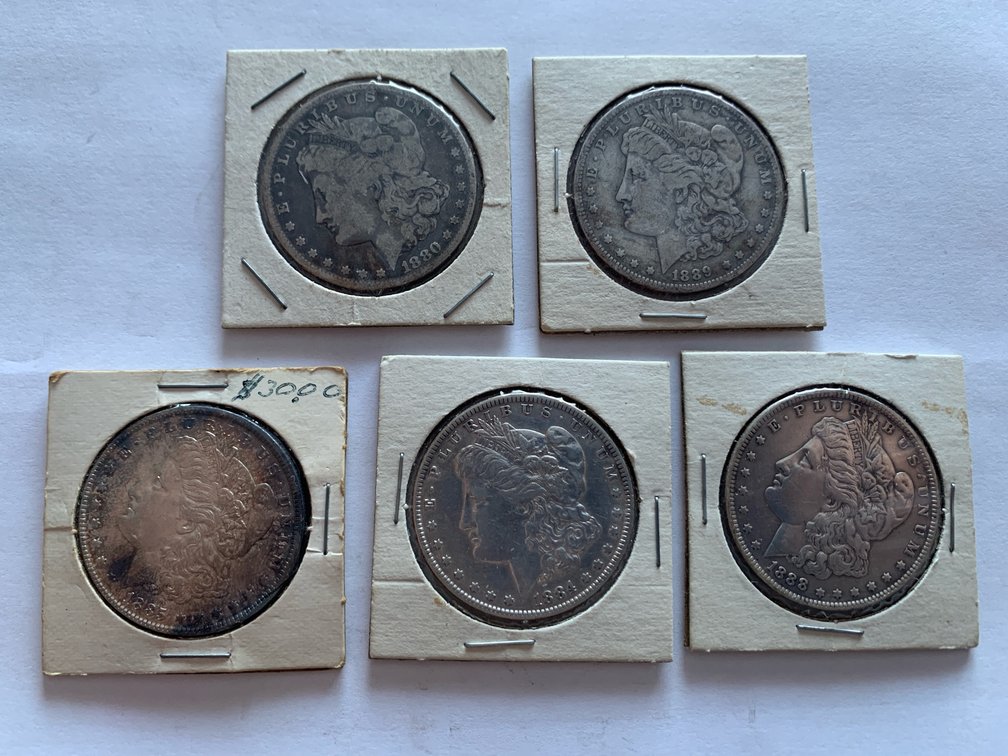 Five “Morgan” Silver Dollars. 90% Silver. Each Has 0.7734 Troy Ounces of Silver