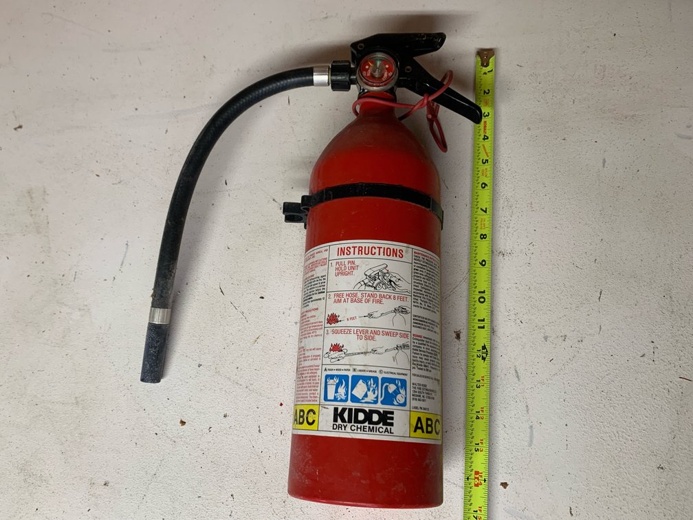 Kiddie Fire Extinguisher. Needs charged.