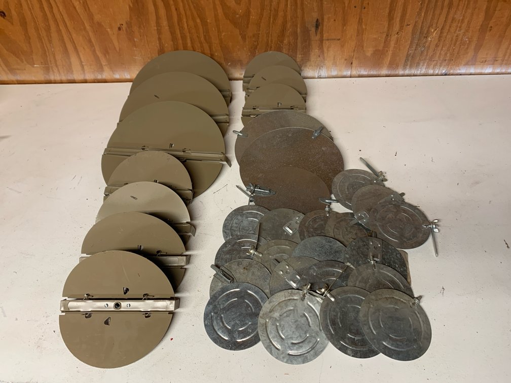 Round Dampers. Three are 11 3/4” Dia. Four Are 7 3/4” Dia. Three Are 6 3/4” Dia. Also Nineteen 4 3/4” Dia. Galvanized and Two 9 3/4” Galvanized.
