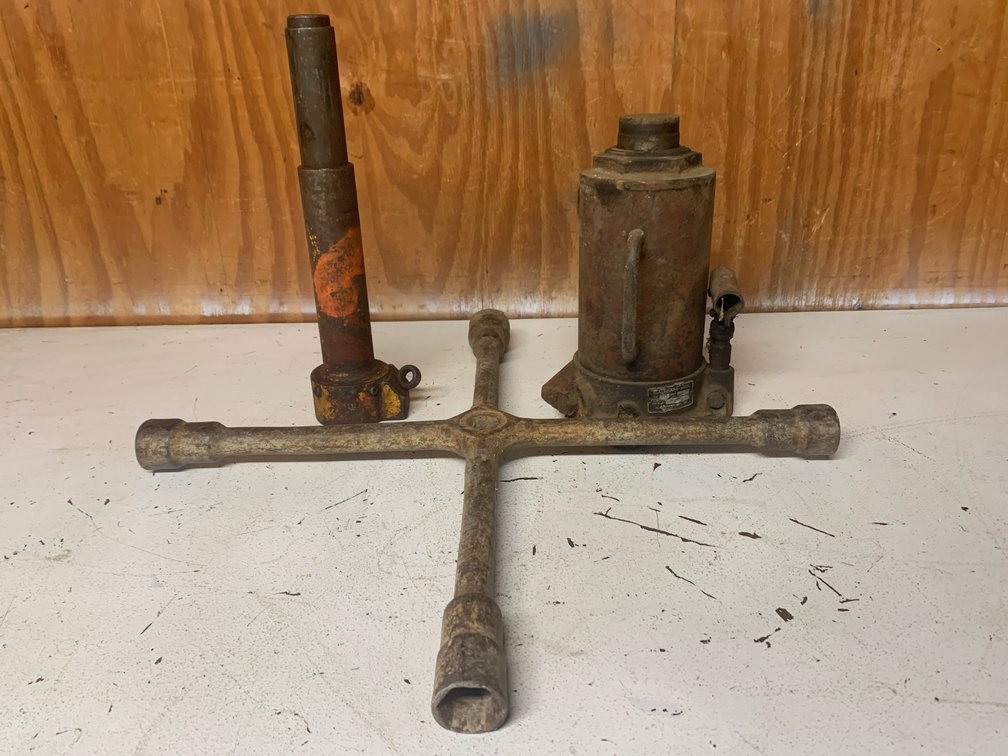Two Bottle Jacks and A Lug Wrench