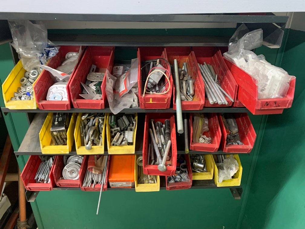 Three Shelf Parts Organizer With Contents. 33” Long. 23” Tall