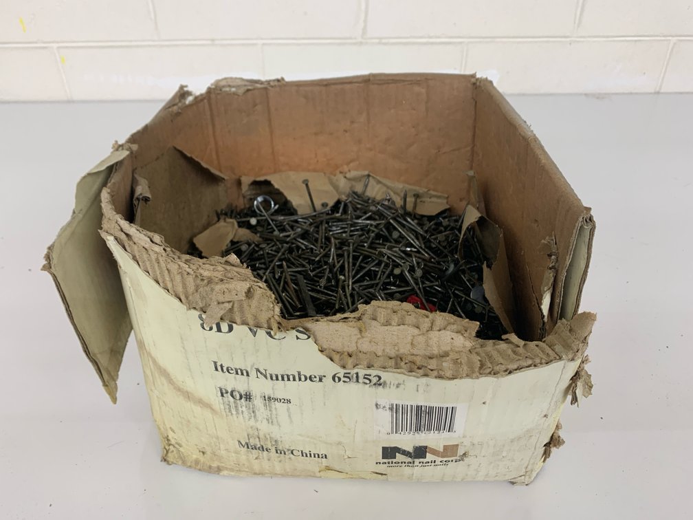 Partial Box Of 8D Coated Nails