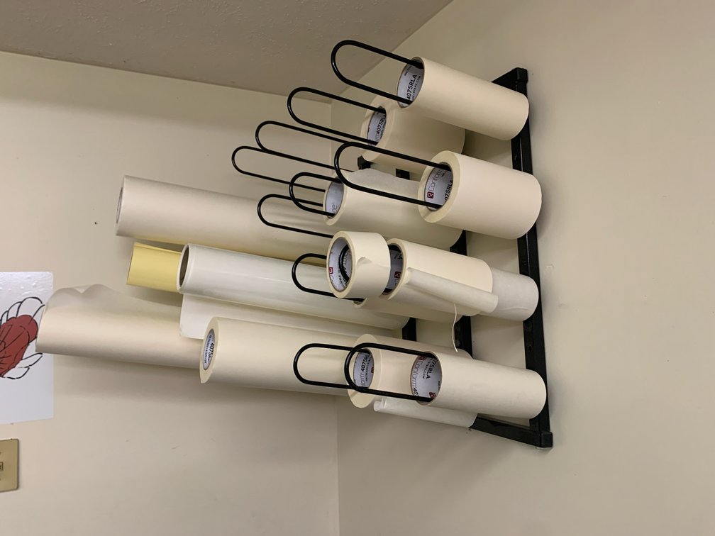 Rolls Of Application Tape And Material For A Printer. Rack Included