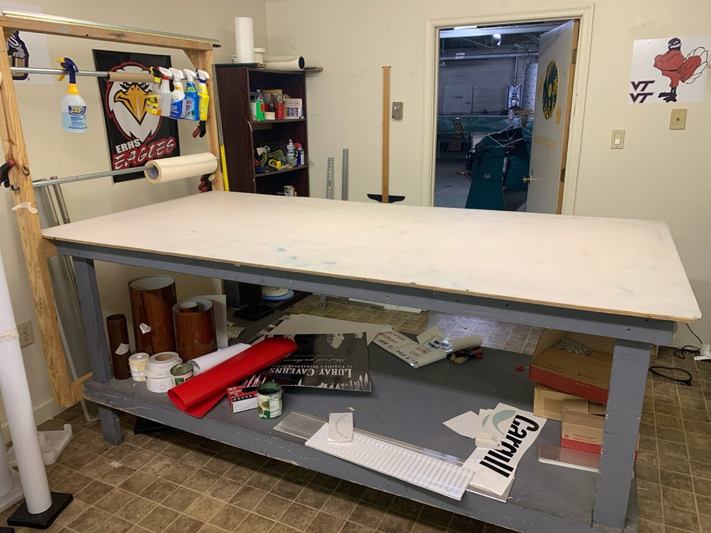 Work Table For A Printing Room With Lower Shelf. Table Top Is 96”x48” and 42” Tall. Contents Not Included