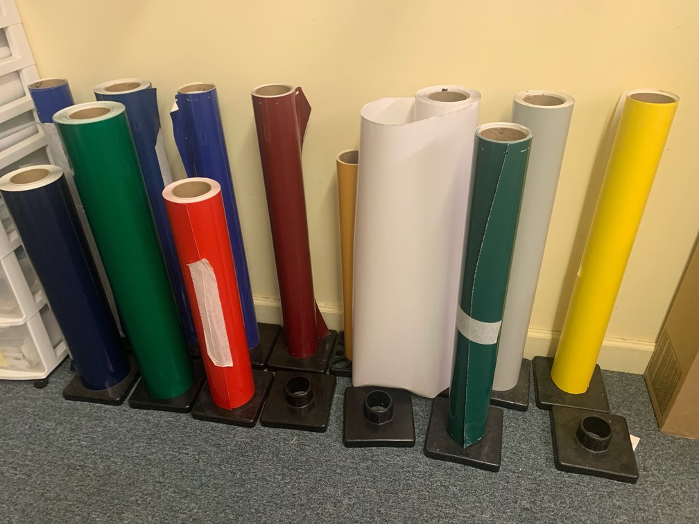 12 Assorted Rolls Of Material For A Plotter. 24” and 30”