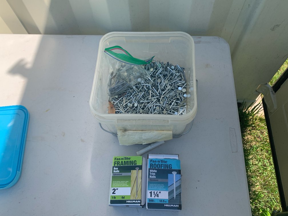 Partial Boxes Of 1 1/4” Roofing Nails, 1 1/4” White Trim Nails, and 2” Galvanized 6d Nails