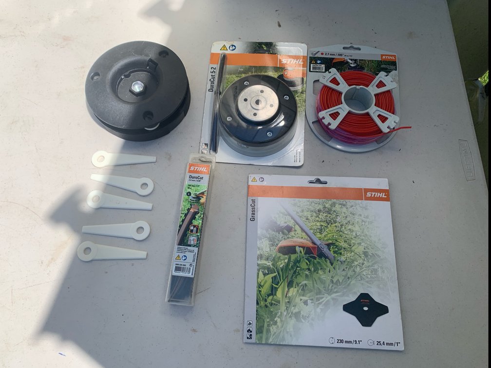 Assorted Accessories For A Weedeater